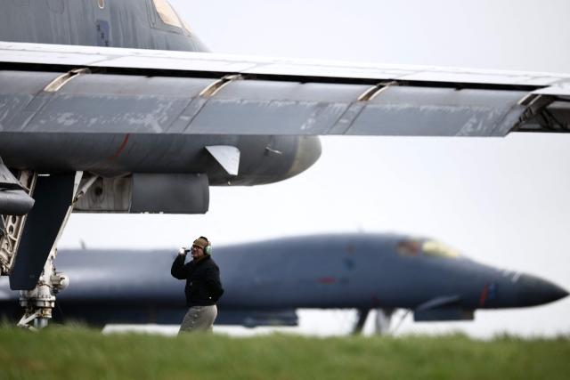A US Air Force B-1 Lancer bombers carrying Joint Direct Attack Munitions (JDAM) are prepared for take off, from RAF Fairford in south-west England on March 13, 2026. Fairford is one of two bases, along with the Diego Garcia facility in the Indian Ocean, that the UK has given the US permission to use for "specific defensive operations into Iran" to destroy Iranian missiles at source, the British defence minister said in a statement. (Photo by Henry NICHOLLS / AFP)