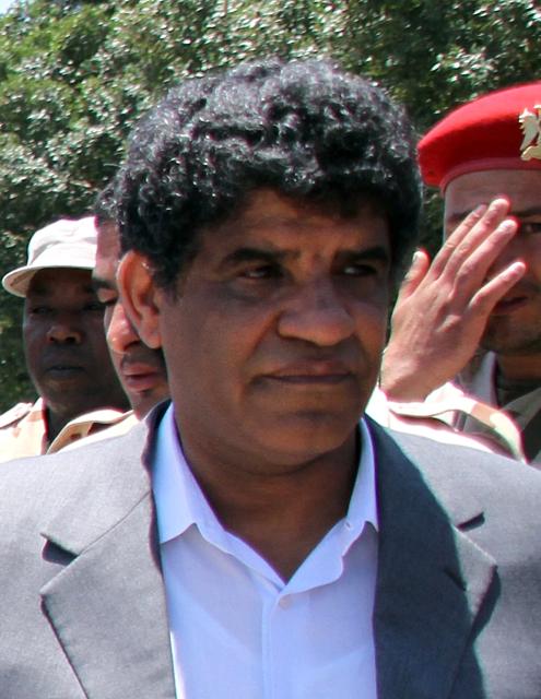 (FILES) Head of Libyan intelligence, Abdullah al-Senussi, 62, is pictured in Tripoli on June 22, 2011. Judges at the International Criminal Court issued an arrest warrant for Libyan leader Moamer Kadhafi, his son Seif al-Islam and Senussi for war crimes and crimes against humanity on June 27, 2011. AFP PHOTO/STR. In September 2025, the Paris criminal court handed down a heavy sentence against Nicolas Sarkozy, punishing "corruption at the highest level" of "exceptional gravity" in order "to obtain Libyas commitment to provide financial support" for his 2007 presidential campaign. Nicolas Sarkozy, who has always disputed this account, will now have to challenge on appeal the findings of the trial judges, who identified him as both an actor in and a beneficiary of a criminal conspiracy starting on March 16, 2026. (Photo by AFP)
