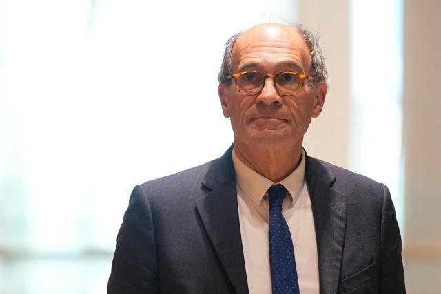 (FILES) Eric Woerth, defendant and former head of campaign financing of French president Nicolas Sarkozy is seen at Paris courthouse in Paris, on January 6, 2025, during a break of the opening hearing of Sarkozy's trial on charges of accepting illegal campaign financing in an alleged pact with the late Libyan dictator Moamer Kadhafi. In September 2025, the Paris criminal court handed down a heavy sentence against Nicolas Sarkozy, punishing "corruption at the highest level" of "exceptional gravity" in order "to obtain Libyas commitment to provide financial support" for his 2007 presidential campaign. Nicolas Sarkozy, who has always disputed this account, will now have to challenge on appeal the findings of the trial judges, who identified him as both an actor in and a beneficiary of a criminal conspiracy starting on March 16, 2026. (Photo by Dimitar DILKOFF / AFP)