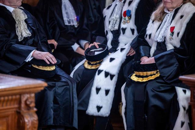 Judges from the Court of Auditors attend the investiture ceremony of newly appointed French Court of Auditors president Amelie de Montchalin (unseen) at the Court of Auditors headquarters in Paris, on March 13, 2026. (Photo by Christophe PETIT TESSON / POOL / AFP)