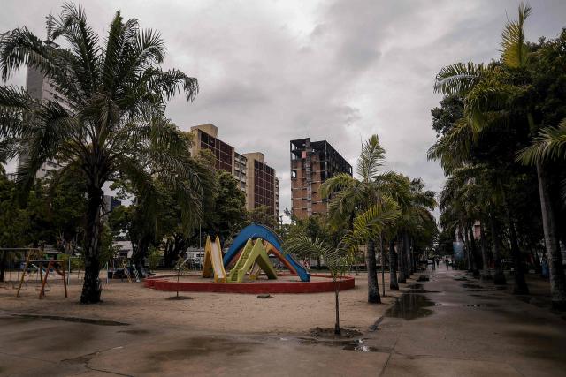 A view of the 13 de Maio park that was the scenario of the film "O Agente Secreto" (The Secret Agent) is pictured at the city center of Recife, Pernambuco state, Brazil, on February 13, 2026. The northeastern Brazilian city of Recife, where the Oscar-nominated movie "The Secret Agent" is set, is revelling in its moment in the limelight as tourists flock to film locations and a classic local shirt flies off the shelves. (Photo by BRENDA ALCANTARA / AFP)