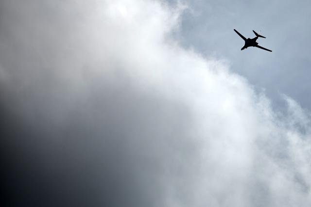 A US Air Force B-1 Lancer bomber jet carrying Joint Direct Attack Munitions (JDAM) takes off from RAF Fairford in south-west England on March 13, 2026. Fairford is one of two bases, along with the Diego Garcia facility in the Indian Ocean, that the UK has given the US permission to use for "specific defensive operations into Iran" to destroy Iranian missiles at source, the British defence minister said in a statement. (Photo by Henry Nicholls / AFP)