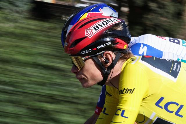 Team Visma - Lease a Bike's Danish rider Jonas Vingegaard, wearing the overall leader yellow jersey, rides with the pack during the 6th stage of the Paris-Nice cycling race, 179.3 km between Barbentane and Apt, on March 13, 2026. (Photo by Anne-Christine POUJOULAT / AFP)