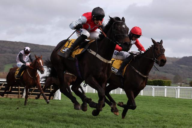 Jockey Patrick Mullins rides racehorse Apolon De Charnie (R) to win the JCB Triumph Hurdle horse race on the fourth day of the Cheltenham Festival at Cheltenham Racecourse, in Cheltenham, western England on March 13, 2026. (Photo by Adrian Dennis / AFP)