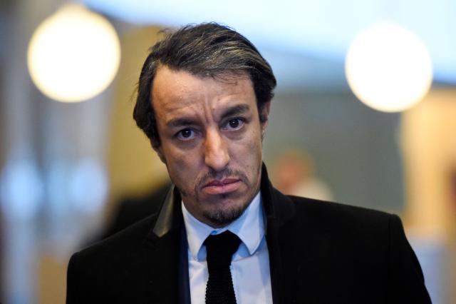 (FILES) French former lawyer Karim Achoui is pictured at the criminal court of Melun, south of Paris, on February 2, 2016, ahead of an appeal trial of Ruddy Terranova and Mamadou Ba, who were acquitted two and a half years ago for the attempted murder of Achaoui. The appeal trial of Karim Achoui for the illegal practice of the legal profession start on March 16, 2026. (Photo by LIONEL BONAVENTURE / AFP)