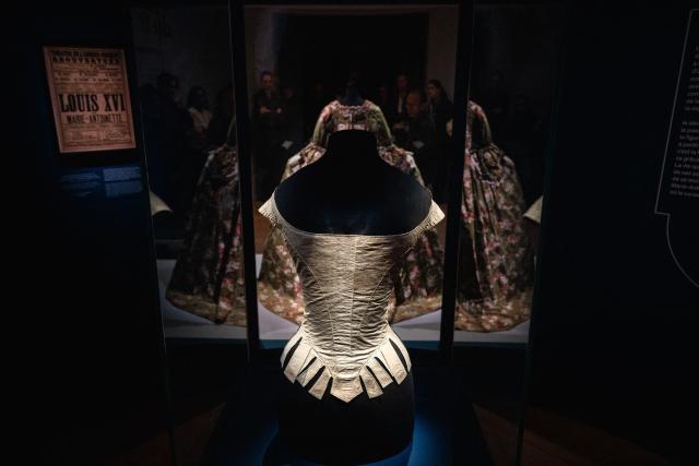 This photograph shows the corset of Queen Marie-Antoinette displayed during the exhibition "Fashion in the 18th Century. A Fantasized Legacy" at the Galliera Palais fashion museum in Paris on March 13, 2026. The exhibition runs from March 14, 2026, to July 12, 2026. (Photo by Dimitar DILKOFF / AFP)