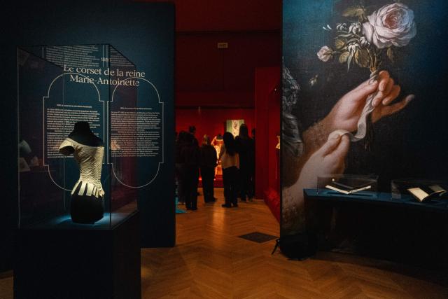 This photograph shows the corset of Queen Marie-Antoinette (L) displayed during the exhibition "Fashion in the 18th Century. A Fantasized Legacy" at the Galliera Palais fashion museum in Paris on March 13, 2026. The exhibition runs from March 14, 2026, to July 12, 2026. (Photo by Dimitar DILKOFF / AFP)