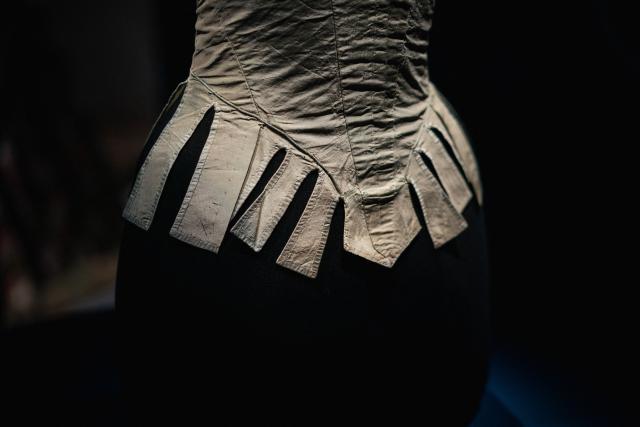 This photograph shows the corset of Queen Marie-Antoinette (detail) displayed during the exhibition "Fashion in the 18th Century. A Fantasized Legacy" at the Galliera Palais fashion museum in Paris on March 13, 2026. The exhibition runs from March 14, 2026, to July 12, 2026. (Photo by Dimitar DILKOFF / AFP)