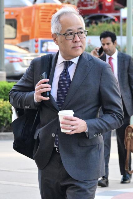 Attorney Luis Li, representing YouTube and Google arrives at Los Angeles Superior Court during the social media trial tasked to determine whether social media giants deliberately designed their platforms to be addictive to children, in Los Angeles, on March 13, 2026. Jury deliberations are set to begin Friday in a landmark social media addiction trial accusing Meta and YouTube of intentionally trying to hook young internet users. (Photo by Frederic J. Brown / AFP)