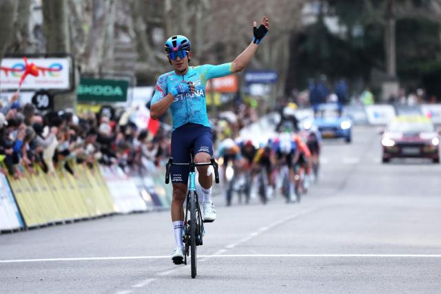 XDS Astana Team's Colombian rider Harold Tejada celebrates as he crosses the finish line to win the 6th stage of the Paris-Nice cycling race, 179.3 km between Barbentane and Apt, on March 13, 2026. (Photo by Anne-Christine POUJOULAT / AFP)