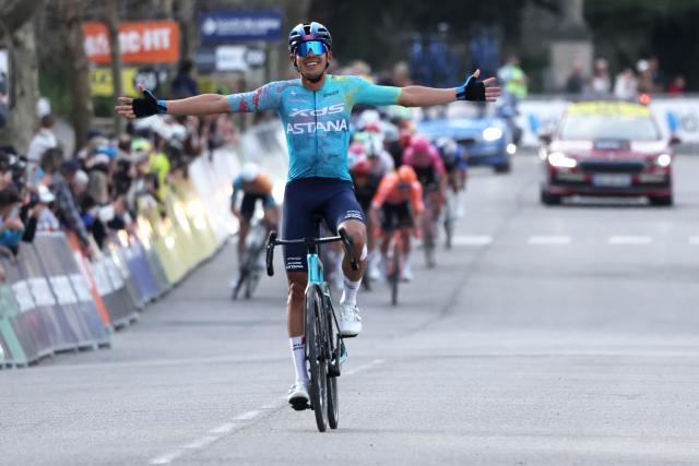 XDS Astana Team's Colombian rider Harold Tejada celebrates as he crosses the finish line to win the 6th stage of the Paris-Nice cycling race, 179.3 km between Barbentane and Apt, on March 13, 2026. (Photo by Anne-Christine POUJOULAT / AFP)