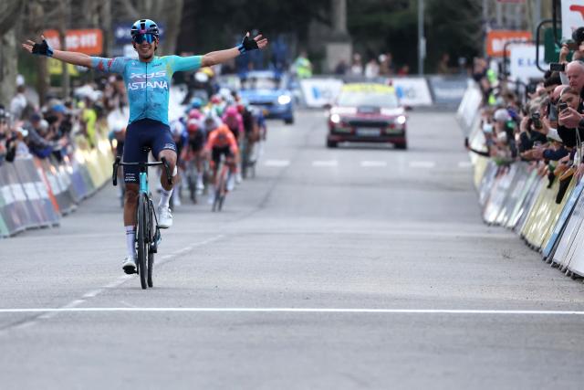 XDS Astana Team's Colombian rider Harold Tejada celebrates as he crosses the finish line to win the 6th stage of the Paris-Nice cycling race, 179.3 km between Barbentane and Apt, on March 13, 2026. (Photo by Anne-Christine POUJOULAT / AFP)