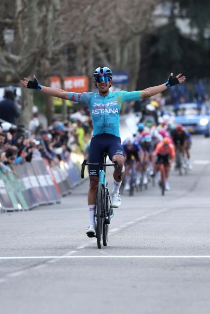 XDS Astana Team's Colombian rider Harold Tejada celebrates as he crosses the finish line to win the 6th stage of the Paris-Nice cycling race, 179.3 km between Barbentane and Apt, on March 13, 2026. (Photo by Anne-Christine POUJOULAT / AFP)