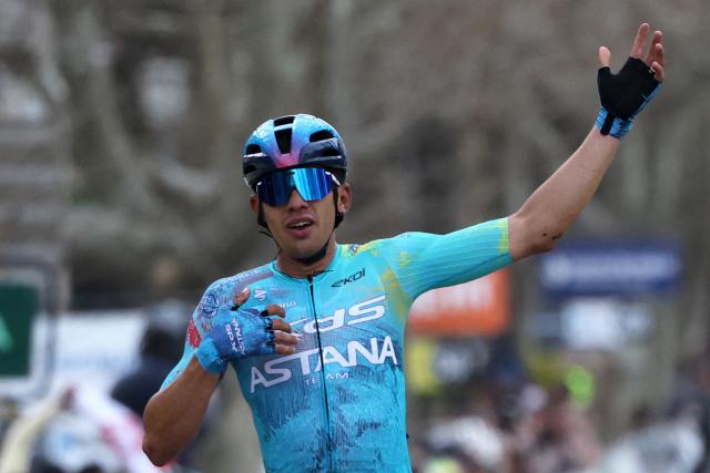 XDS Astana Team's Colombian rider Harold Tejada celebrates as he crosses the finish line to win the 6th stage of the Paris-Nice cycling race, 179.3 km between Barbentane and Apt, on March 13, 2026. (Photo by Anne-Christine POUJOULAT / AFP)
