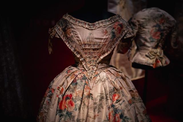 This picture shows a "Robe a transformation" (day bodice, evening bodice and skirt), circa 1850, displayed during the exhibition "Fashion in the 18th Century, A Fantasized Legacy" at the Galliera Palais fashion museum in Paris on March 13, 2026. The exhibition runs from March 14, 2026, to July 12, 2026. (Photo by Dimitar DILKOFF / AFP)