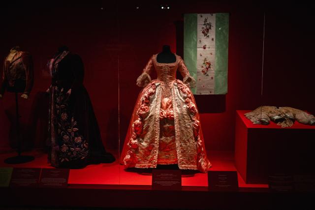 This picture shows a "Robe a l'anglaise" and skirt (C), circa 1780-1785, altered in the late 19th century or in the early 20th century, displayed during the exhibition "Fashion in the 18th Century, A Fantasized Legacy" at the Galliera Palais fashion museum in Paris on March 13, 2026. The exhibition runs from March 14, 2026, to July 12, 2026. (Photo by Dimitar DILKOFF / AFP)
