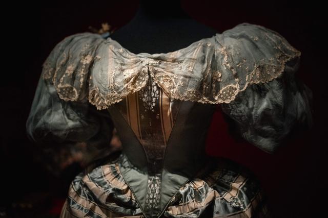 This picture shows an Evening or ball down (bodice, skirt and pannier) 1890s, displayed during the exhibition "Fashion in the 18th Century, A Fantasized Legacy" at the Galliera Palais fashion museum in Paris on March 13, 2026. The exhibition runs from March 14, 2026, to July 12, 2026. (Photo by Dimitar DILKOFF / AFP)