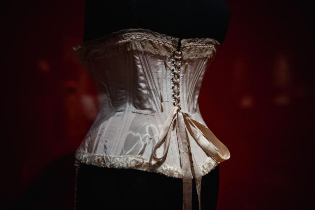 This picture shows a Corset that may have belonged to Mathilde Bonaparte (1820-1904), also known as Princess Mathilde, niece of Napoleon, circa 1870, displayed during the exhibition "Fashion in the 18th Century, A Fantasized Legacy" at the Galliera Palais fashion museum in Paris on March 13, 2026. The exhibition runs from March 14, 2026, to July 12, 2026. (Photo by Dimitar DILKOFF / AFP)