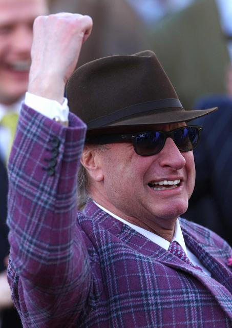 Racehorse owner Rich Ricci celebrates after his horse Gaelic Warrior ridden by jockey Paul Townend won the Gold Cup chase horse race on the fourth day of the Cheltenham Festival at Cheltenham Racecourse, in Cheltenham, western England on March 13, 2026. (Photo by Adrian Dennis / AFP)
