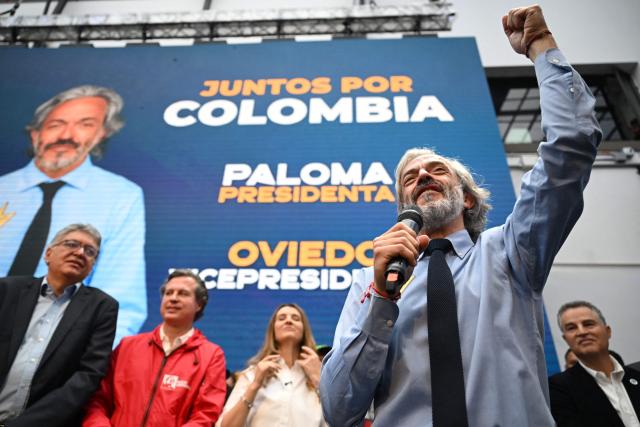 Colombia's vice-presidential candidate for the conservative Democratic Centre party, Juan Daniel Oviedo speaks during a rally after registering his candidacy, in Bogota, on March 12, 2026. Colombia will hold presidential elections on May 31, 2026. (Photo by RAUL ARBOLEDA / AFP)