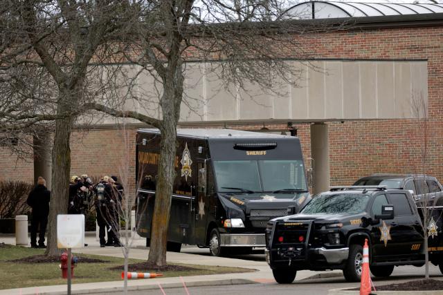 Oakland County Sheriff Deputies prepare to enter Temple Israel synagogue in West Bloomfield, Michigan, on March 13, 2026, after a person drove a vehicle into the synagogue a day earlier. Ayman Mohamad Ghazali, 41, was killed by security guards on March 12, after he rammed his pickup truck into the Temple Israel synagogue on the outskirts of Detroit causing a blaze and triggering a huge police response. US media reported he had recently lost family members in an Israeli strike in Lebanon, as part of the ongoing Middle East war. (Photo by JEFF KOWALSKY / AFP)