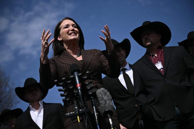 US Secretary of Agriculture Brooke Rollins joined by the National Finals Rodeo champions, speaks to members of the press outside of the West Wing of the White house on March 13, 2026 in Washington, DC. (Photo by Brendan SMIALOWSKI / AFP)