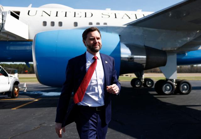 US Vice President JD Vance prepares to board Air Force Two as he returns to Washington, DC at Rocky Mount-Wilson Regional Airport on March 13, 2026 in Elm City, North Carolina. Vance traveled to North Carolina to deliver remarks on the Trump administration's economic agenda. (Photo by Kent Nishimura / POOL / AFP)