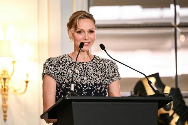 Princess Charlene of Monaco delivers a speech during the Provale Solidarite charity gala at the Hotel Georges V in Paris on March 13, 2026. (Photo by Bertrand GUAY / AFP) / NO TABLOIDS WEB & PRINT, NO DAILY MAIL, NO DAILY MAIL GROUP, NO VOICI, NO CLOSER