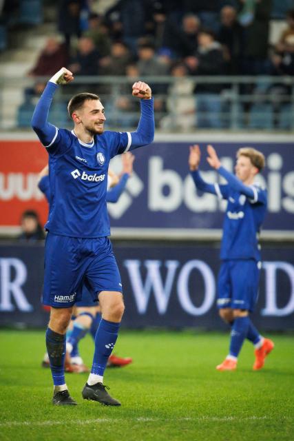 Gent's players celebrate after winning the Belgian Pro League first division football match between KAA Gent and Zulte Waregem in Gent on March 13, 2026. (Photo by KURT DESPLENTER / Belga / AFP) / Belgium OUT