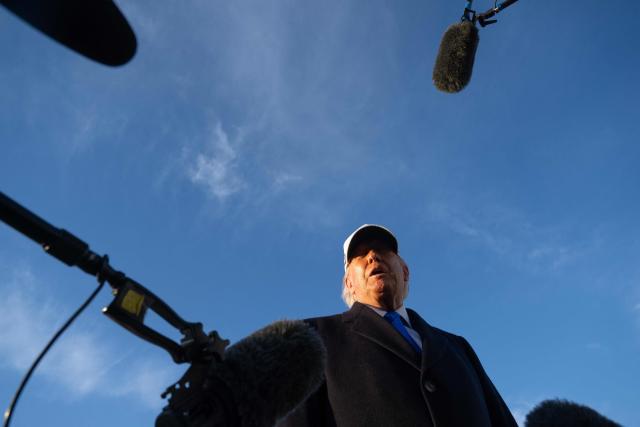 US President Donald Trump speaks to reporters before boarding Air Force One as he departs Joint Base Andrews in Maryland on March 13, 2026. President Trump is heading to Florida to spend the weekend at his Mar-a-Lago resort. (Photo by SAUL LOEB / AFP)