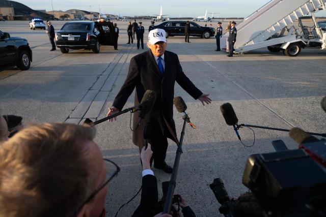 US President Donald Trump speaks to reporters before boarding Air Force One as he departs Joint Base Andrews in Maryland on March 13, 2026. President Trump is heading to Florida to spend the weekend at his Mar-a-Lago resort. (Photo by SAUL LOEB / AFP)