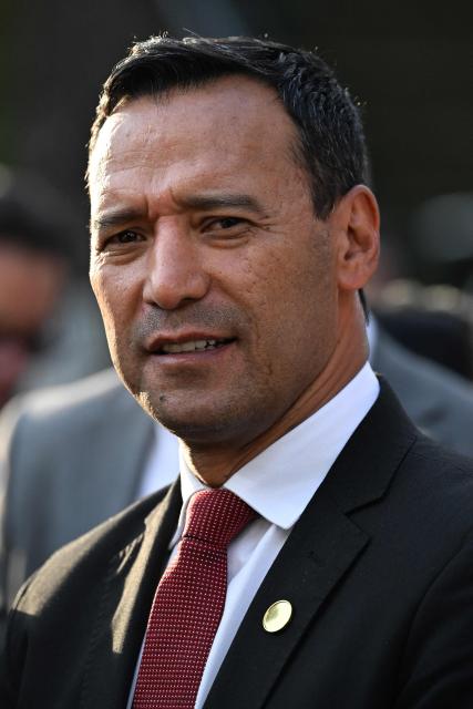 Colombia's Defense Minister Pedro Arnulfo Sanchez gestures during a press conference following a meeting with Venezuela's interim President Delcy Rodriguez at the Miraflores Presidential Palace in Caracas on March 13, 2026. Venezuela met with a Colombian high-level delegation on March 13, 2026, after the Venezuelan government announced the previous day that a meeting between the presidents of both countries, which was to take place at a border bridge, had been canceled. (Photo by Juan BARRETO / AFP)