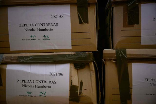 (FILES) Folders are pictured on the first day of the appeal trial of Nicolas Zepeda, a Chilean man accused of allegedly murdering his Japanese ex-girlfriend in France in 2016, in Vesoul, eastern France, on December 4, 2023. Chilean national Nicolas Zepeda, accused of murdering his Japanese ex-girlfriend in Besançon will face his third trial at the assize court in Lyon on March 17, 2026. (Photo by Sebastien Bozon / AFP) / The erroneous mention[s] appearing in the metadata of this photo by Sebastien Bozon has been modified in AFP systems in the following manner: [December 4] instead of [December 5]. Please immediately remove the erroneous mention[s] from all your online services and delete it (them) from your servers. If you have been authorized by AFP to distribute it (them) to third parties, please ensure that the same actions are carried out by them. Failure to promptly comply with these instructions will entail liability on your part for any continued or post notification usage. Therefore we thank you very much for all your attention and prompt action. We are sorry for the inconvenience this notification may cause and remain at your disposal for any further information you may require.