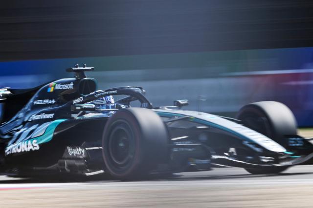 Mercedes' British driver George Russell drives during the sprint race ahead of the Formula One Chinese Grand Prix at the Shanghai International Circuit in Shanghai on March 14, 2026. (Photo by Hector RETAMAL / AFP)