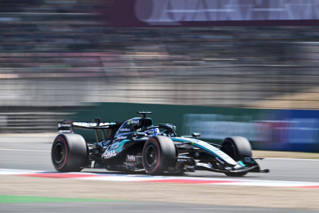 Mercedes' British driver George Russell drives during the sprint race ahead of the Formula One Chinese Grand Prix at the Shanghai International Circuit in Shanghai on March 14, 2026. (Photo by Hector RETAMAL / AFP)