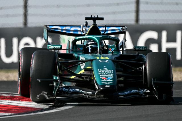 Aston Martin's Canadian driver Lance Stroll drives during the qualifying session ahead of the Formula One Chinese Grand Prix at the Shanghai International Circuit in Shanghai on March 14, 2026. (Photo by Greg Baker / AFP)
