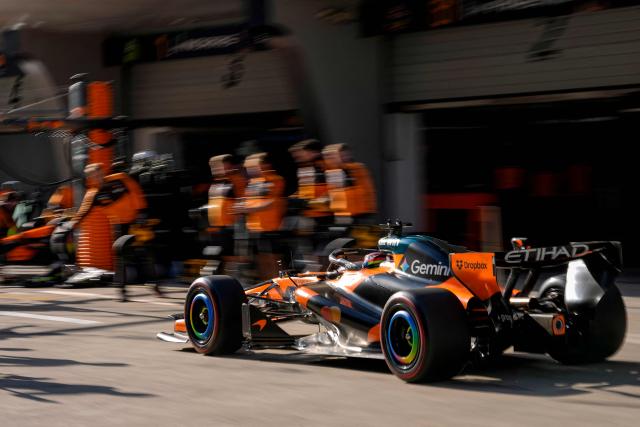 McLaren's Australian driver Oscar Piastri arrives in the pits during the qualifying session ahead of the Formula One Chinese Grand Prix at the Shanghai International Circuit in Shanghai on March 14, 2026. (Photo by Andy Wong / POOL / AFP)
