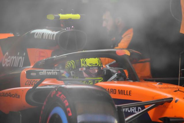 McLaren's British driver Lando Norris sits in his car in the pits during the qualifying session ahead of the Formula One Chinese Grand Prix at the Shanghai International Circuit in Shanghai on March 14, 2026. (Photo by Andy Wong / POOL / AFP)