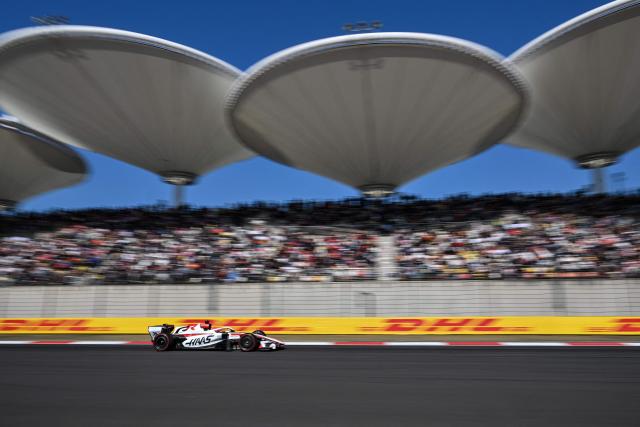 Haas F1 Team's French driver Esteban Ocon drives during the qualifying session ahead of the Formula One Chinese Grand Prix at the Shanghai International Circuit in Shanghai on March 14, 2026. (Photo by Hector RETAMAL / AFP)