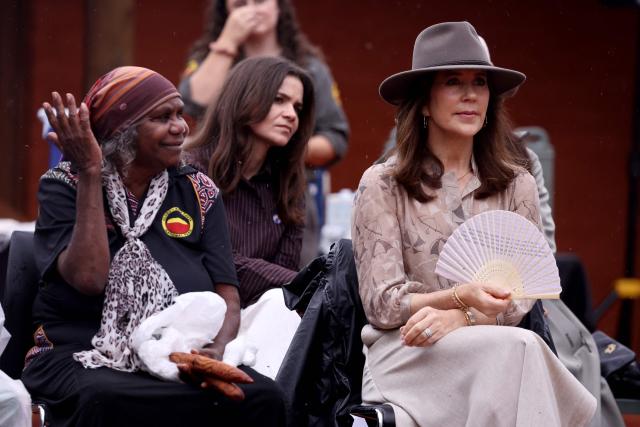 Denmark's Queen Mary (R) watches a ceremonial song and dance at the Uluru-Kata Tjuta National Park Cultural Centre at Uluru on March 14, 2026, during their five-day state visit to Australia. (Photo by David GRAY / POOL / AFP)
