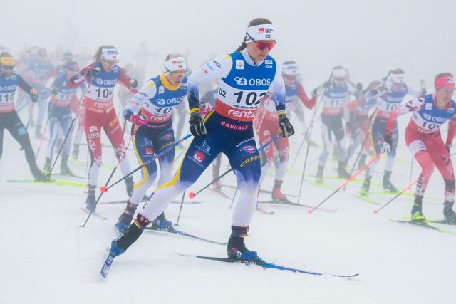Sweden's Moa Ilar (C) and others compete during fog in the women's mass start 50km free race of the FIS Cross-Country World Cup in Holmenkollen, Oslo on March 14, 2026. (Photo by Terje Pedersen / NTB / AFP) / Norway OUT