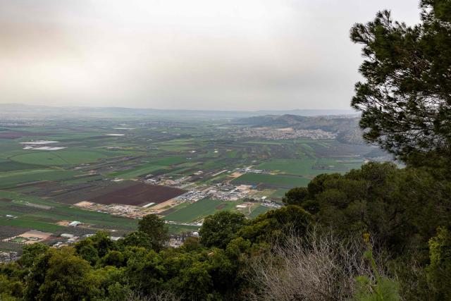 Lower Galilee farmland is seen from Mount Tabor, on March 14, 2026. Galilee is a mountainous, fertile region in northern Israel bordered by the Jordan Valley and the Mediterranean. (Photo by Odd ANDERSEN / AFP)