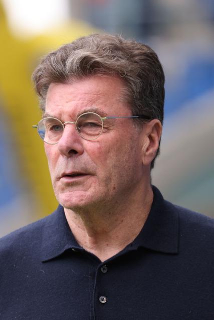 VfL Wolfsburg's head coach Dieter Hecking is pictured prior to the start of the German first division Bundesliga football match between TSG 1899 Hoffenheim and VfL Wolfsburg in Sinsheim, southwestern Germany on March 14, 2026. (Photo by Daniel ROLAND / AFP) / DFL REGULATIONS PROHIBIT ANY USE OF PHOTOGRAPHS AS IMAGE SEQUENCES AND/OR QUASI-VIDEO