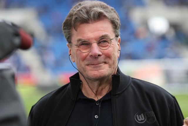 VfL Wolfsburg's head coach Dieter Hecking reacts prior to the start of the German first division Bundesliga football match between TSG 1899 Hoffenheim and VfL Wolfsburg in Sinsheim, southwestern Germany on March 14, 2026. (Photo by Daniel ROLAND / AFP) / DFL REGULATIONS PROHIBIT ANY USE OF PHOTOGRAPHS AS IMAGE SEQUENCES AND/OR QUASI-VIDEO