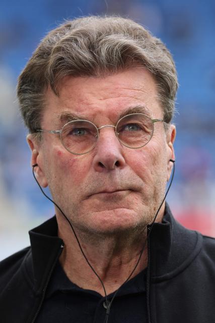 VfL Wolfsburg's head coach Dieter Hecking looks down prior to the start of the German first division Bundesliga football match between TSG 1899 Hoffenheim and VfL Wolfsburg in Sinsheim, southwestern Germany on March 14, 2026. (Photo by Daniel ROLAND / AFP) / DFL REGULATIONS PROHIBIT ANY USE OF PHOTOGRAPHS AS IMAGE SEQUENCES AND/OR QUASI-VIDEO