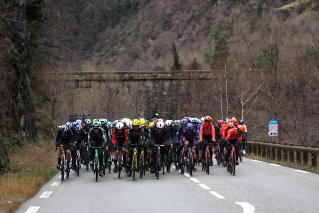 The pack rides during the 7th stage of the Paris-Nice cycling race, 47 km between Le Broc and Isola-Village, on March 14, 2026. Due to deteriorating weather conditions, the route of stage 7 has been changed to a 47 km race from Le Broc to Isola. (Photo by Anne-Christine POUJOULAT / AFP)