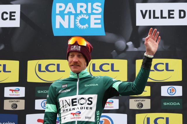 INEOS Grenadiers' French rider Dorian Godon celebrates his green jersey of best sprinter on the podium after the 7th stage of the Paris-Nice cycling race, 47 km between Le Broc and Isola-Village, on March 14, 2026. Due to deteriorating weather conditions, the route of stage 7 has been changed to a 47 km race from Le Broc to Isola. (Photo by Anne-Christine POUJOULAT / AFP)