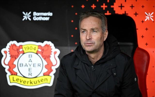 Bayer Leverkusen's Danish head coach Kasper Hjulmand sits on the bench prior to the German first division Bundesliga football match between Bayer 04 Leverkusen and FC Bayern Munich in Leverkusen, western Germany on March 14, 2026. (Photo by INA FASSBENDER / AFP) / DFL REGULATIONS PROHIBIT ANY USE OF PHOTOGRAPHS AS IMAGE SEQUENCES AND/OR QUASI-VIDEO
