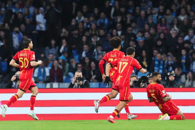 Lecce's German defender #5 Jamil Siebert (R) celebrates scoring his team's first goal during the Italian Serie A football match between Napoli and Lecce at the Diego Armando Maradona stadium in Naples, southern Italy, on March 14, 2026. (Photo by CARLO HERMANN / AFP)