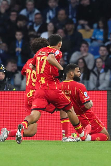 Lecce's German defender #5 Jamil Siebert (R) celebrates scoring his team's first goal during the Italian Serie A football match between Napoli and Lecce at the Diego Armando Maradona stadium in Naples, southern Italy, on March 14, 2026. (Photo by CARLO HERMANN / AFP)